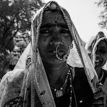Black and White Photography with the title 'India 11'. Portrait of an Indian woman with a nose ring.